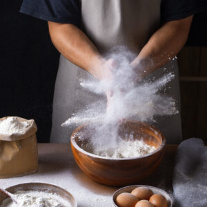 person-cooking-with-flour